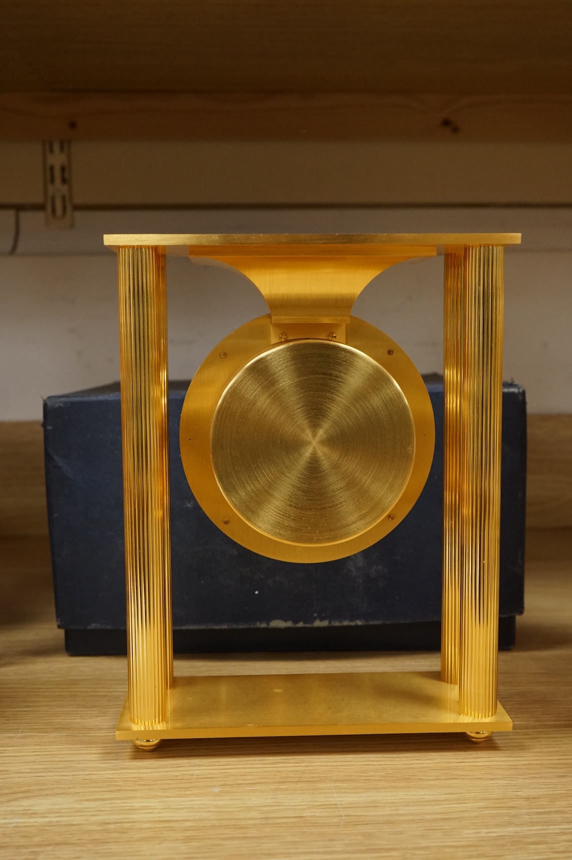 A 1970's Hour Lavigne gilt bronze clock, boxed, 26cm